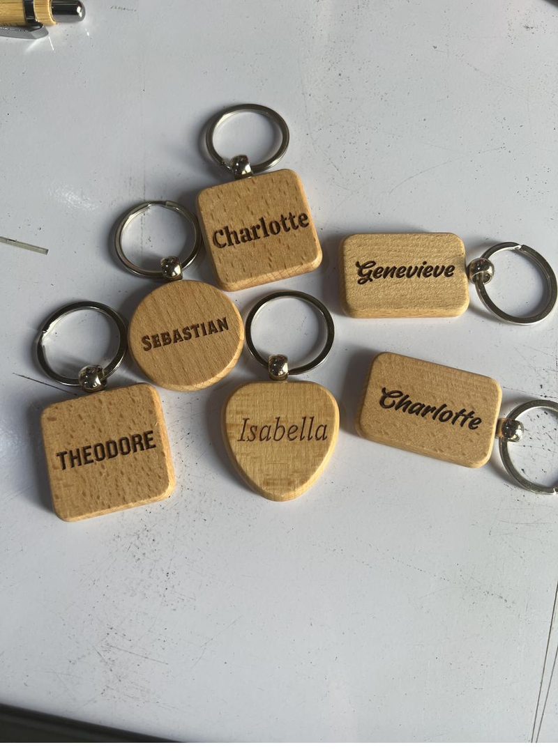 Wooden name keychains engraved with a CO2 laser
