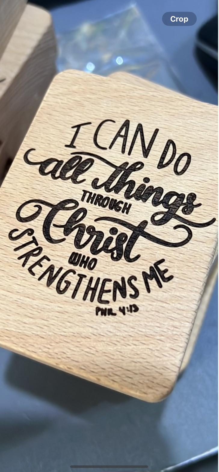 Wooden cellphone holder engraved with a laser